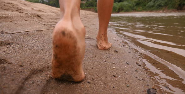 feet-walking-on-sand-stock-footage-videohive